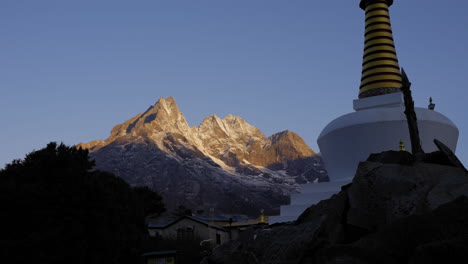 gliding shot of himalayas from a village in nepal