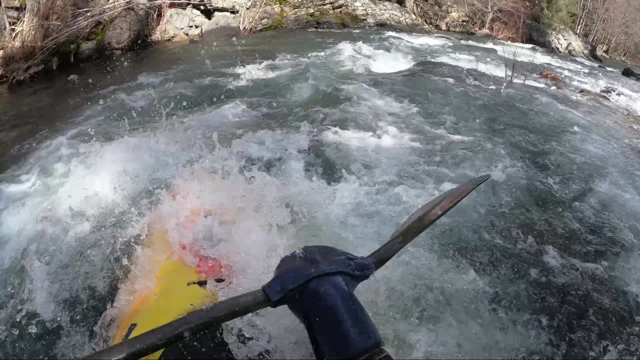 First person view of whitewater kayak on the Applegate River on the border of California and Oregon