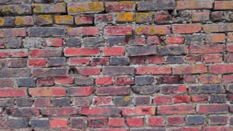 old brick wall in exterior panning from left to right uninterrupted