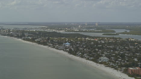 fort myers beach florida aerial v7 luxury beachfront living panoramic aerial reveal along the shoreline - dji inspire 2, x7, 6k - march 2020