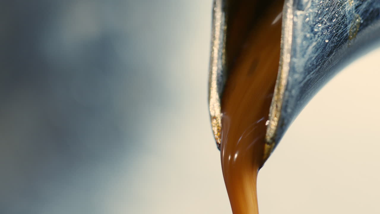 Coffee runs out of a coffee machine