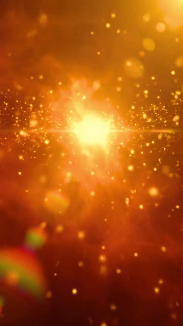 Particelle di luce dorata astratte che fluttuano in una nebulosa arancione incandescente