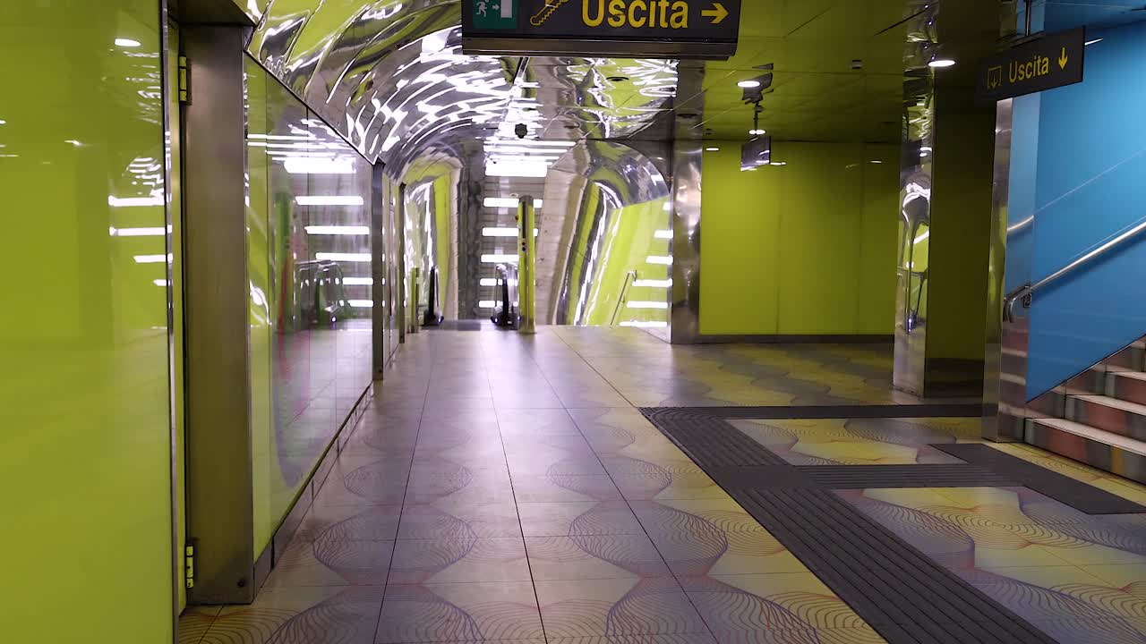 Brightly lit, colorful metro station in Naples