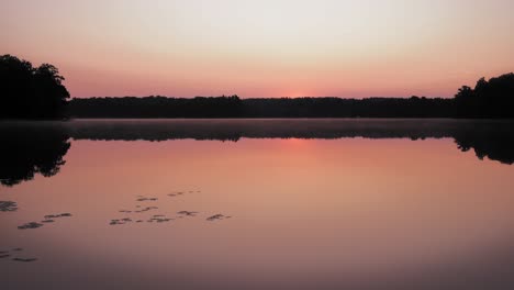 sunrise over peaceful lake