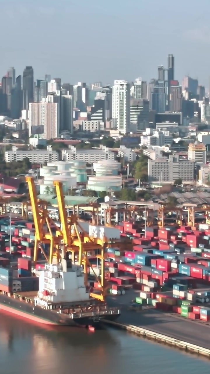 Cityscape of Bangkok showing shipping containers and tall buildings
