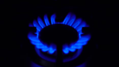 the gas burner turns on in the dark. stove works at the household gas. the flame is blue.