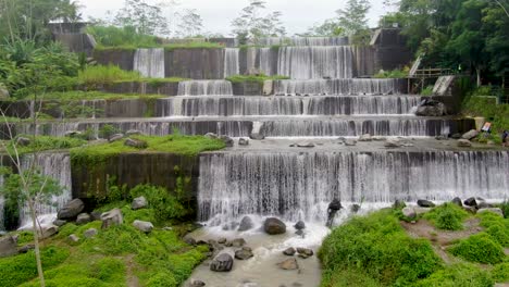 grojogan watu purbo waterfall in sleman, java, indonesia, aerial close up