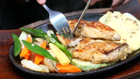 grilled chicken steak with mashed potatoes and vegetables