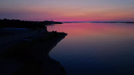 aerial of red glow sunrise over a calm lake-1