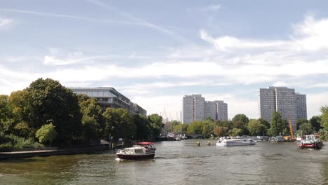 Berlin-canal-with-a-boat-passing-by