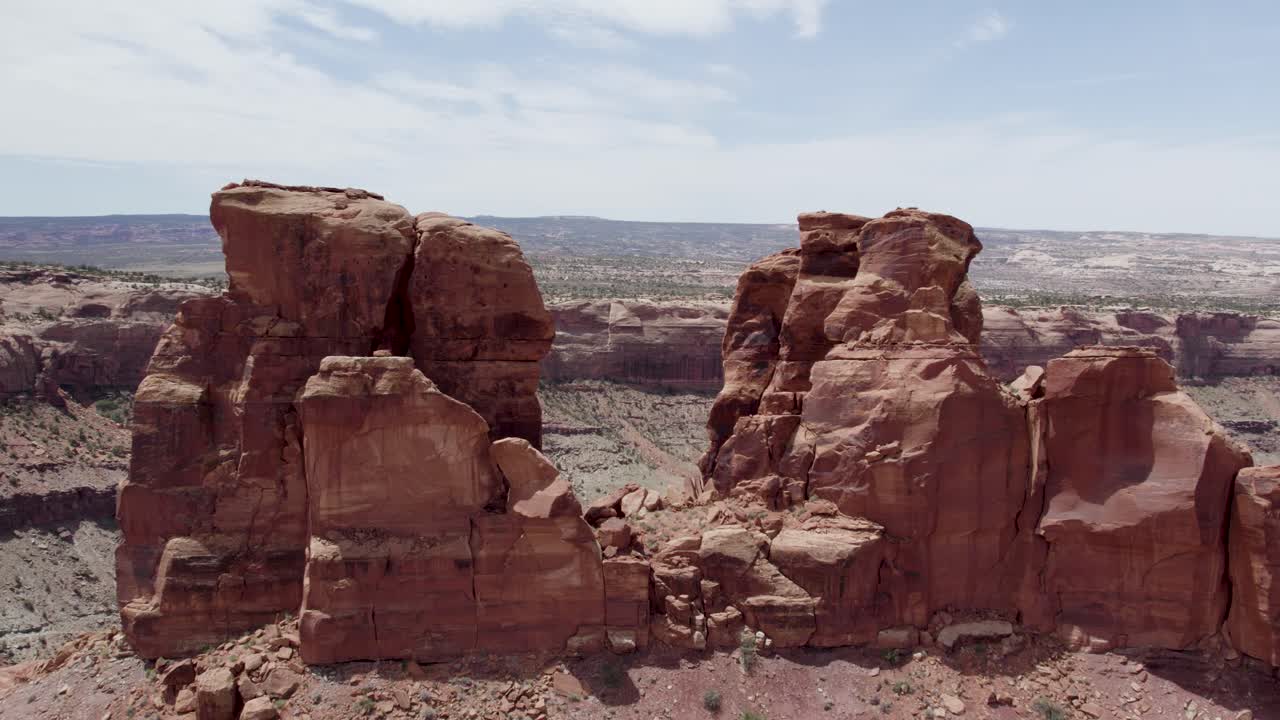 Aerial Flight through Red Rock Sandstone Cliffs in the Southwest Desert near Moab, Utah