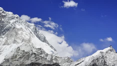 breathtaking view of the snow-capped himalayan range seen along the iconic everest base camp trekking route in nepal.