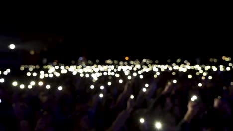 concert crowd with mobile lights