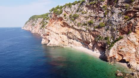 Hidden-Sandy-Pasjaca-Beach-near-Dubrovnik,-Dalmatia,-Croatia---Aerial