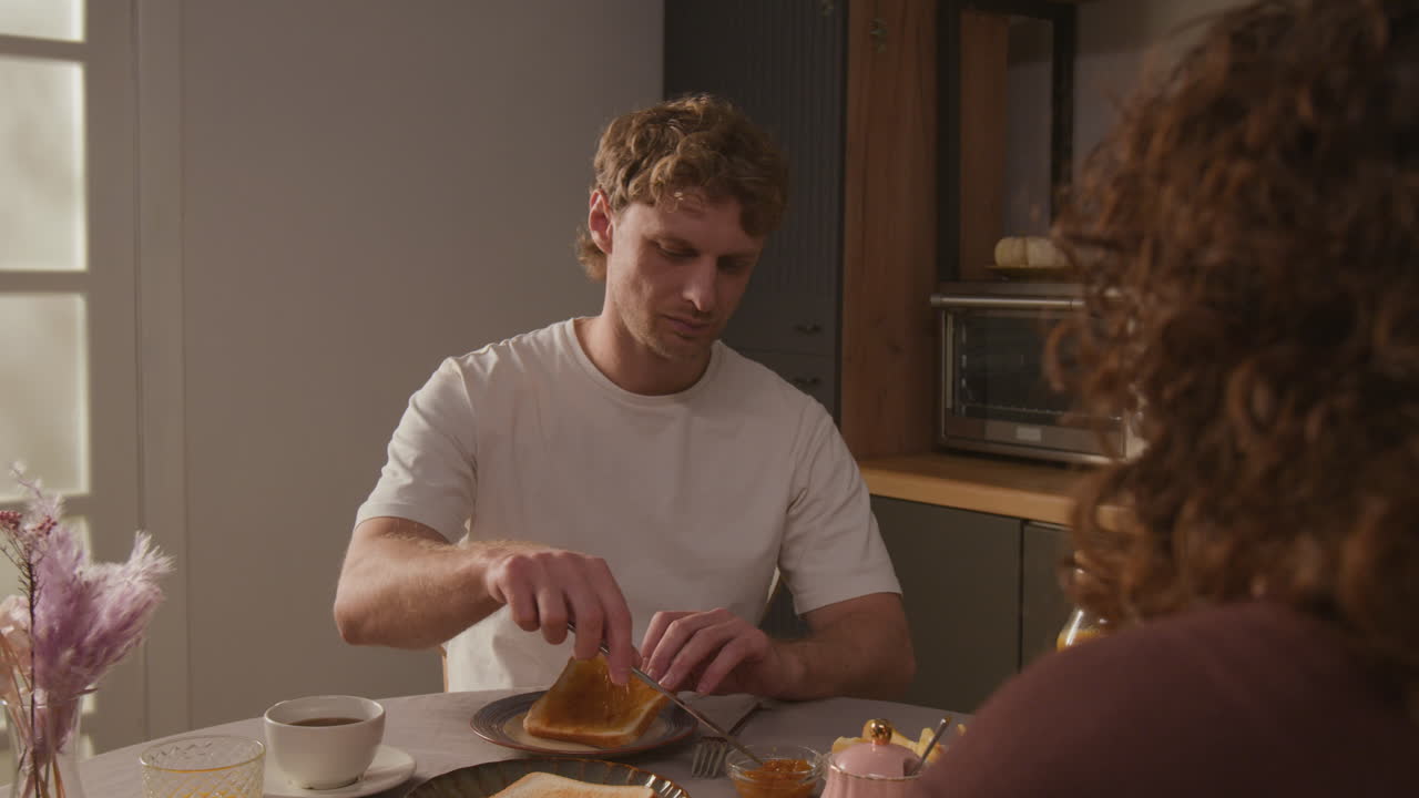 People having breakfast together