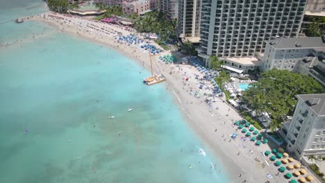 Skyscrapers and beach in Pacific Ocean, Waikiki Beach, Oahu, Hawaii, USA