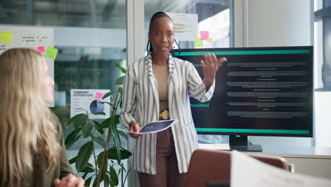 business presentation with colleagues in modern office