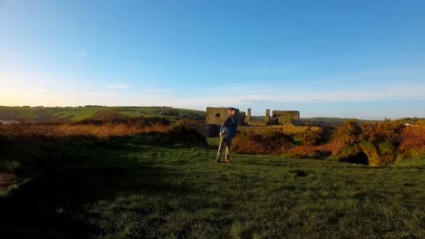 male hiker taking selfie with mobile phone 4k