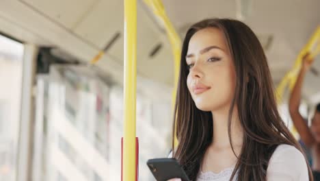 girl spends morning on bus going to college, woman uses public transportation browses social media