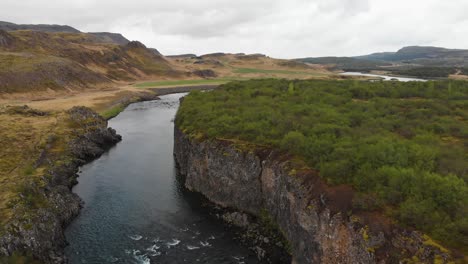 Aerial-video-of-the-river-coming-from-Glanni-waterfall