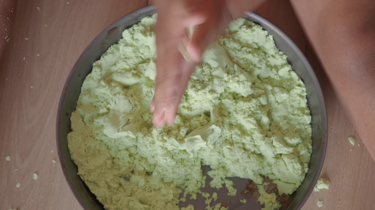 Kids Playing with Green Kinetic Sand