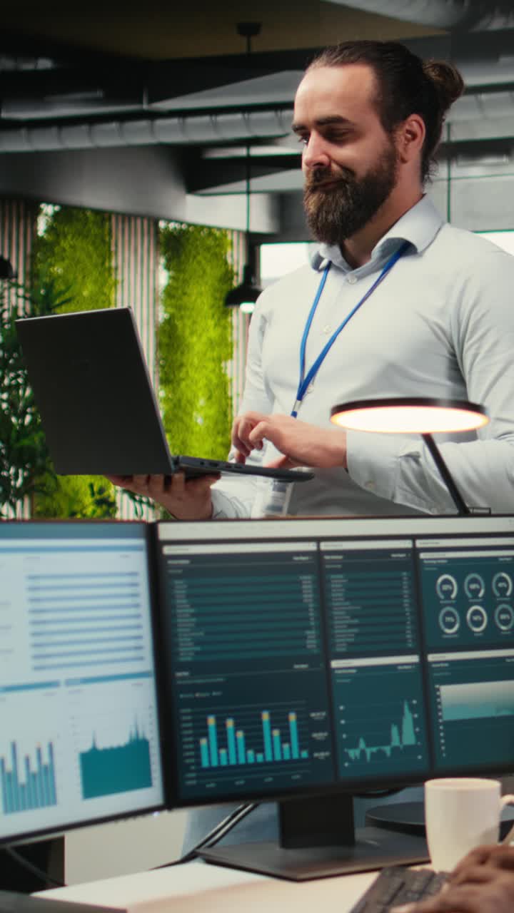 Vertical Video Office administrator completing daily tasks and monitoring work efficiency