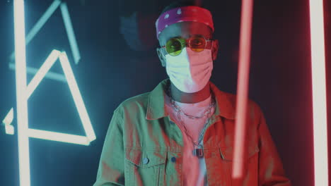 stylish man in neon lights