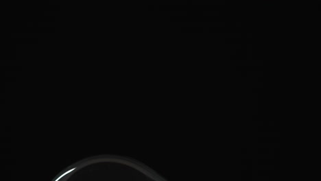 tilt down to light bulb turning on to a very dim level