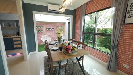 colorful and retro open-plan home decoration with brick wall