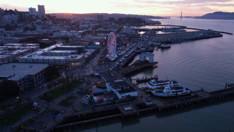 san francisco usa in twilight, aerial view of fisherman's wharf and bay, ferris wheel and pier 39