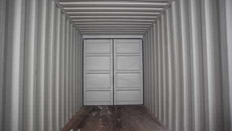 inside an empty shipping container