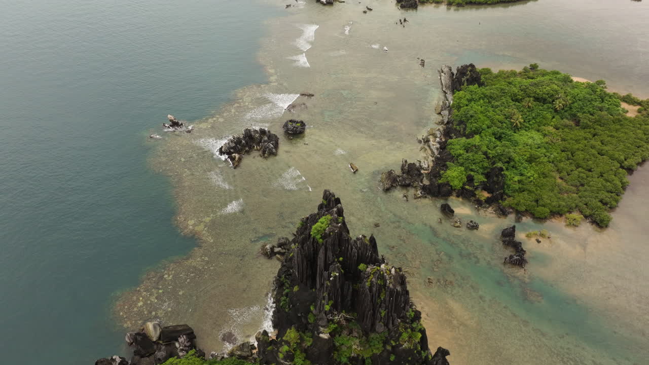 Aerial view of a tropical island with unique rock formations