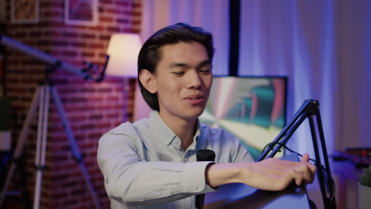 Man Vlogging with Tablet in Home Studio