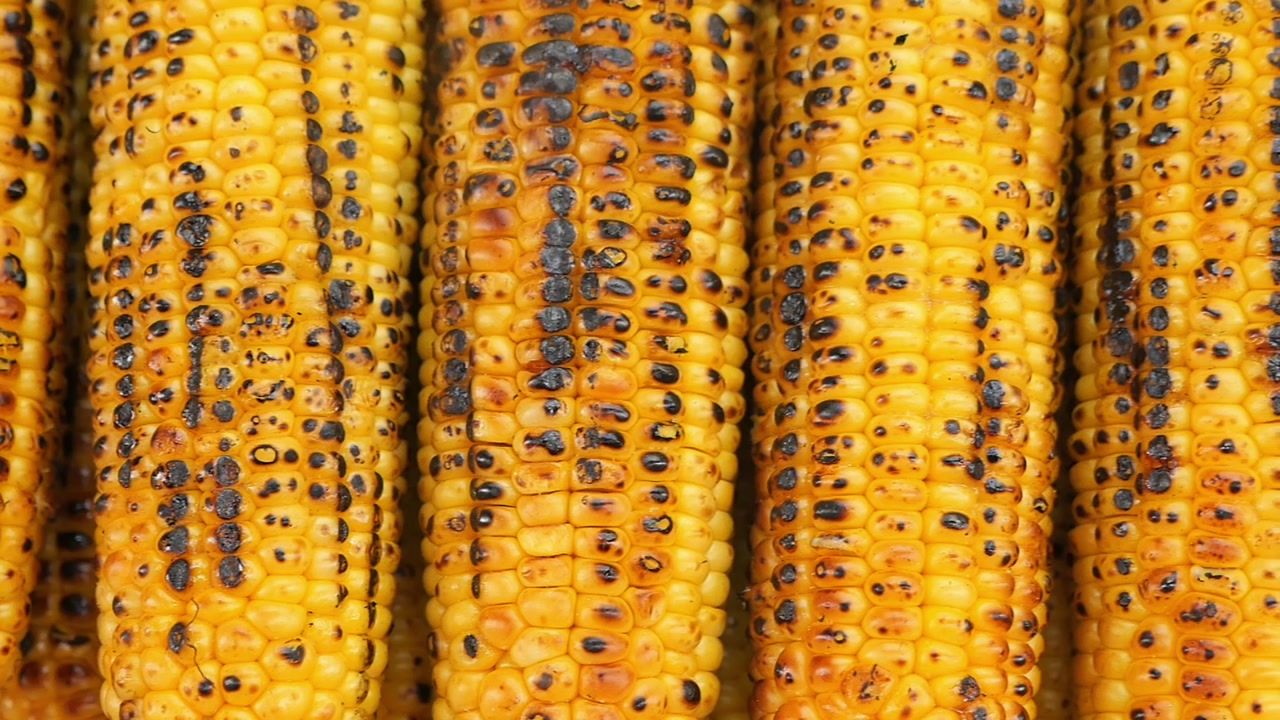 Close-up of Golden Grilled Corn on the Cob with Charred Kernels