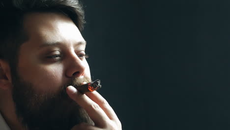 man smoking cigar