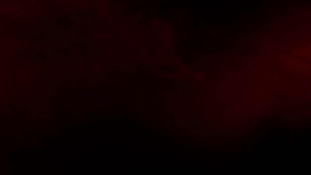 Thick, turbulent red smoke or fog rapidly fills the entire black screen, atmospheric transition or background for horror, passion, or fantasy