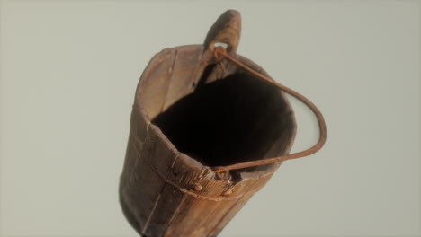 Old-used-rusted-wooden-bucket