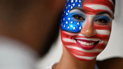 woman with american flag face paint