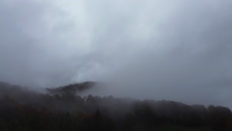 white clouds covering a mountain are nature's embrace and admiring them brings with it nostalgia and a cold ambiance that provokes feelings of heaven of god