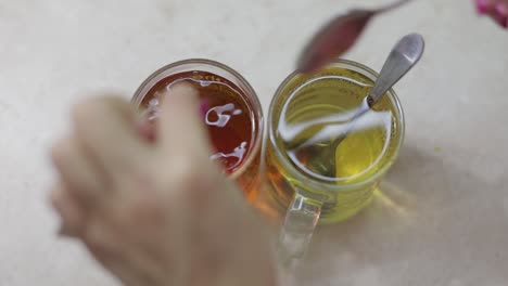 Close-video-of-making-a-cup-of-black-tea-with-a-fresh-tea-bag-in-hot-water