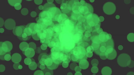 circular pattern of green circles on black background