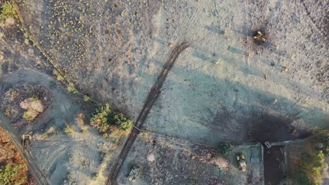 Aerial-drone-birds-eye-view-shot-of-countryside-in-snow