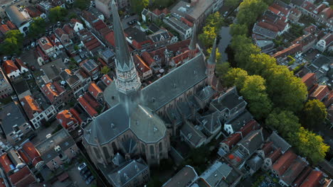 famous tourist attraction of gouwekerk cathedral near gouwe river in gouda, south holland