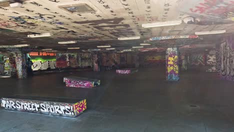 skateboarders performing tricks in urban skatepark