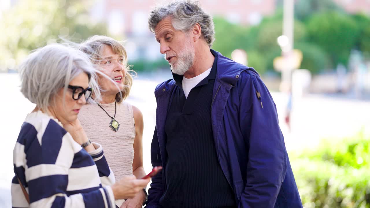 Group of People Conversing Outdoors