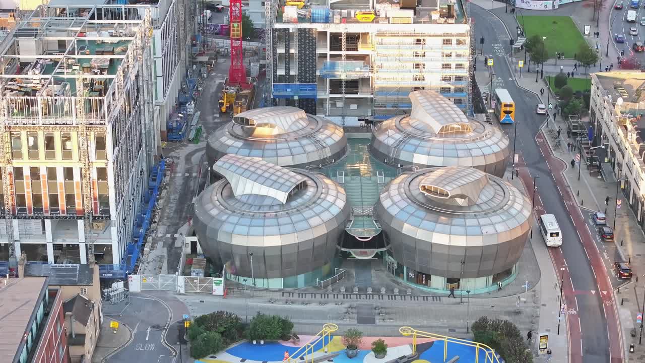 Modern Hallam Students' Union building in the city centre of Sheffield during sunrise