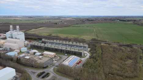 little barford power station green fields in background st neots uk aerial pan footage 4k