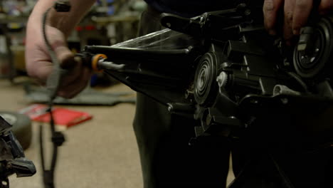 auto mechanic working with car at the garage