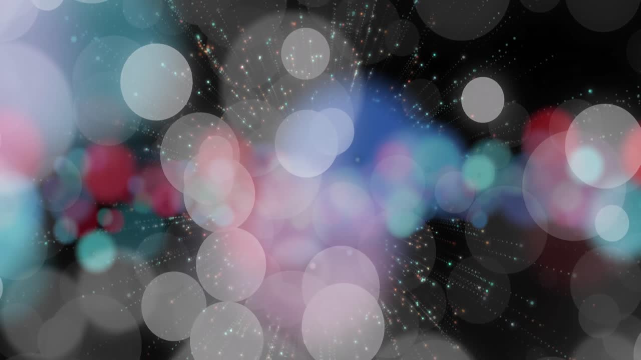 animación de focos y nieve cayendo sobre un fondo negro.