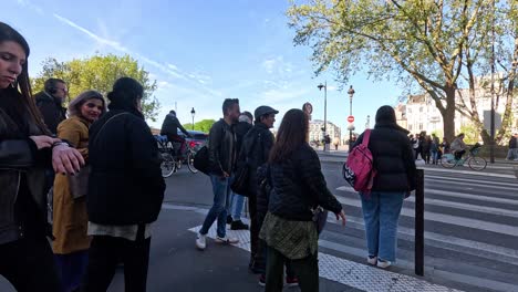 group waiting to cross a street